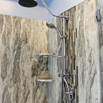 Master Bathroom with Free Standing Tub, Quartz Countertop and Grey Tiled Shower