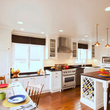 Large L-Shaped White Kitchen with Built-In Wine Rack