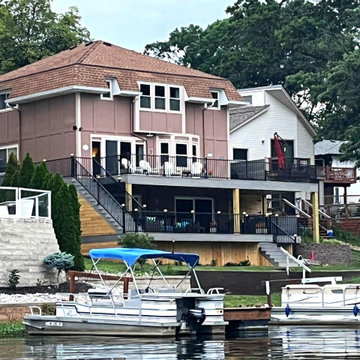 Multi-Level Composite Deck & Underdeck Outdoor Living Space in Lake Waukomis