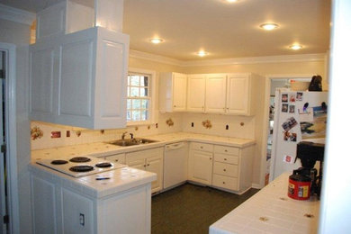 Mountain style home design photo in Raleigh