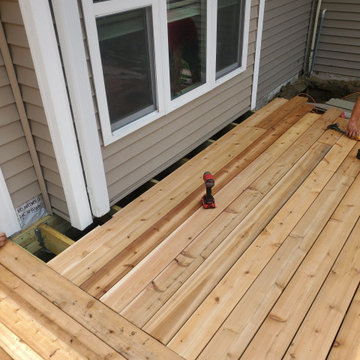 Stamped concrete, cedar deck