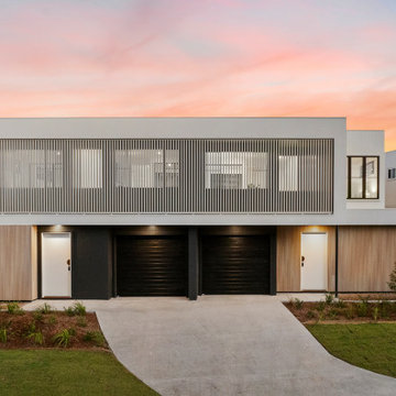 Duplex with shared driveway access