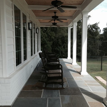 Flagstone porch with a random rectangular pattern