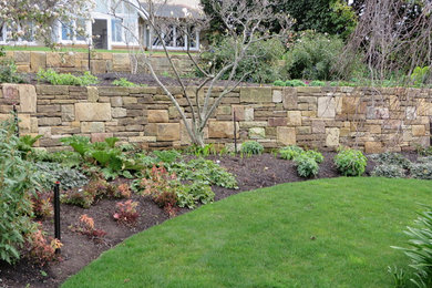 Feature walls and paths in large garden