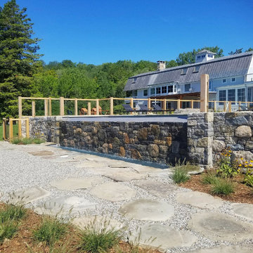 vanishing edge spa + granite decking