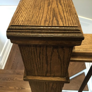 Espresso Stained Oak Staircase w/ Wainscoting, doors & trim