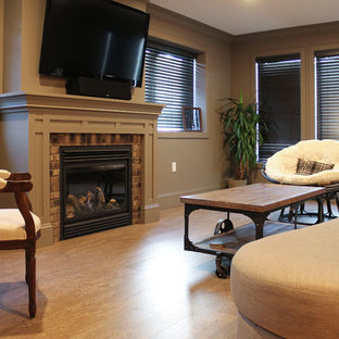 Country walk-out basement in Other with cork flooring, a standard fireplace, a brick fireplace surround and yellow floors.