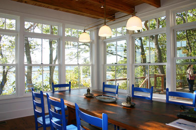 Inspiration for a timeless dark wood floor dining room remodel in New York