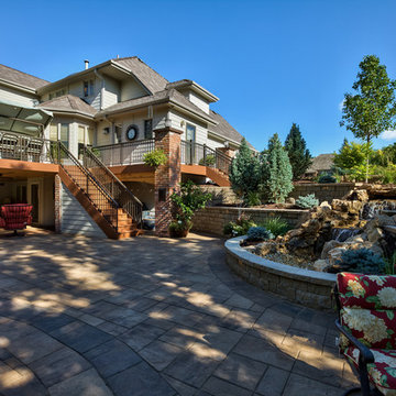 Sprawling Patio Next to Flowing Water Feature