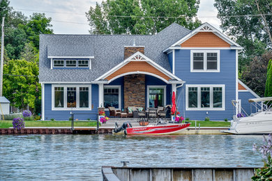 Dock - mid-sized contemporary backyard dock idea in Other with no cover