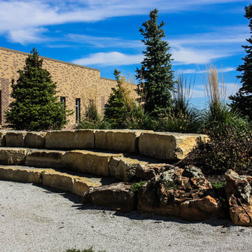Outdoor Seating Next To Rock Formations and Softscapes
