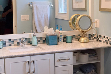 Small transitional master blue tile and glass tile porcelain tile bathroom photo in Detroit with an undermount sink, quartz countertops and blue walls