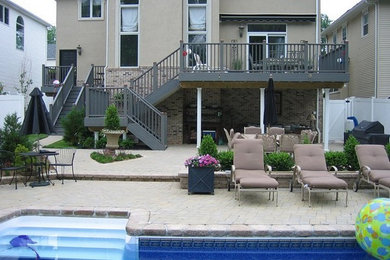 Patio - backyard stone patio idea in DC Metro