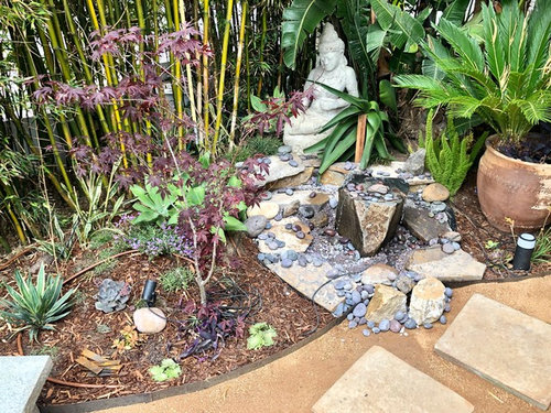 Trying to layout water feature stones. How's this look?