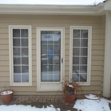New Andersen Windows 400 Series with colonial pine window trim