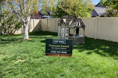 This is an example of a backyard vinyl fence landscaping in Boise.