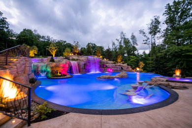 Example of a mountain style pool design in Other
