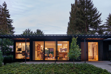 Inspiration for a mid-century modern exterior home remodel in Seattle