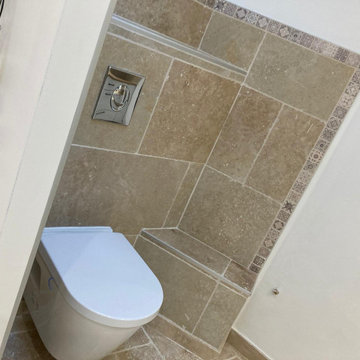 CREATION SALLE DE BAIN EN TRAVERTIN AVEC POSE D'UNE VERRIERE