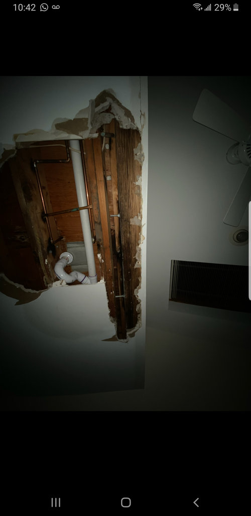 water leaking from shower into bedroom downstairs