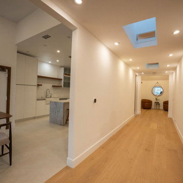 Kitchen and Hall Sightline With Skylight