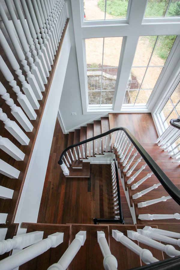 Powerful Impression by Floating Staircase in Suburban Foyer