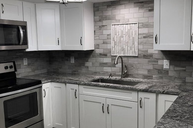 Example of a transitional kitchen design in Other