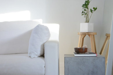 Example of a small danish formal and open concept dark wood floor living room design in Salt Lake City with white walls and no tv