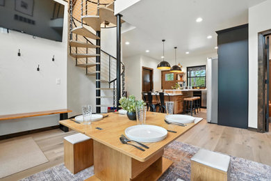 Elegant exposed beam dining room photo in Other