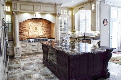 Large elegant l-shaped porcelain tile enclosed kitchen photo in Toronto with an undermount sink, beaded inset cabinets, white cabinets, granite countertops, beige backsplash, stone tile backsplash, stainless steel appliances and an island