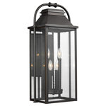 Visual Comfort Studio Collection - Feiss 4-Light Outdoor Lantern, Bronze - The Feiss Wellsworth four light outdoor wall fixture in antique bronze creates a warm and inviting welcome presentation for your home's exterior. A subtle interplay of traditional design elements and nautical influences creates the charming visual approach to the Wellsworth outdoor collection by Feiss. Two very different aesthetics are available. A new Antique Bronze finish paired with Clear Seeded glass creates a more traditional look to these outdoor light fixtures; while a new Painted Brushed Steel finish coupled with Clear glass reflects a more contemporary approach. The Wellsworth collection includes a 3-light outdoor pendant, a 3-light outdoor post lantern, and 3-light small and medium outdoor lanterns, as well as a 4-light large outdoor lantern. Cast aluminum construction ensures durability. Wet Rated.
