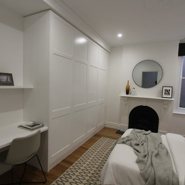 Bed room furniture build in with shaker stryle doors and build-in desk.