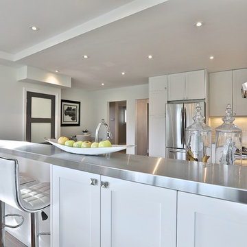 Shaker style kitchen and granite countertop in Toronto