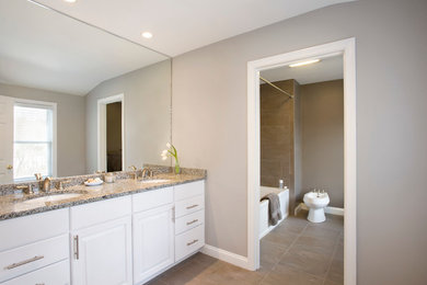 Mid-sized trendy master ceramic tile bathroom photo in Boston with raised-panel cabinets, white cabinets, a bidet, gray walls, an undermount sink and granite countertops