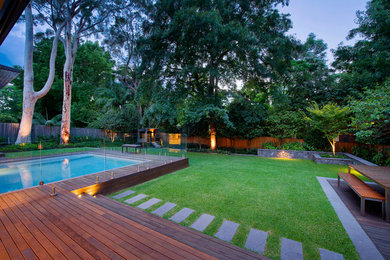 Mid-sized contemporary backyard garden in Sydney.