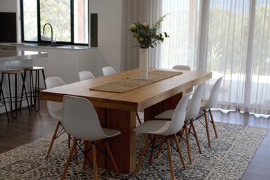 Photo of a scandinavian dining room in Brisbane.