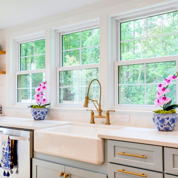 Elegant Light-Filled Kitchen with Quartz Counters & Gold Fixtures