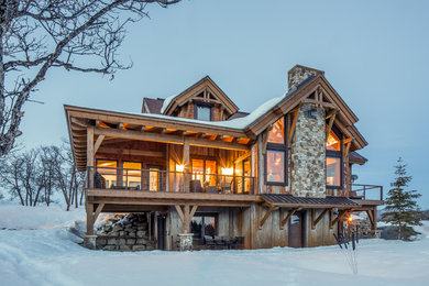 Mid-sized rustic gray three-story mixed siding exterior home idea in Denver with a mixed material roof