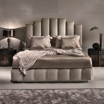 Luxury, feminine bedroom with upholstered bed by Signorini & Coco