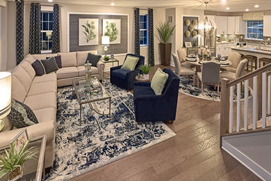 Example of a mid-sized transitional open concept medium tone wood floor and gray floor living room design in Philadelphia with gray walls