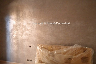 Foto di una camera matrimoniale moderna di medie dimensioni con pareti grigie