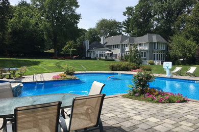 This is an example of an expansive transitional pool in New York.