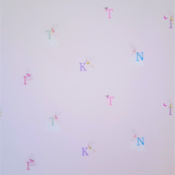Girls room with chalkboard and lots lights