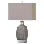 Uttermost - Caffaro Rust Bronze Table Lamp - Heavily Textured Rust Bronze Ceramic Accented With Brushed Nickel Plated Metal Details. The Rectangle Hardback Drum Shade Is A Light Beige Linen Fabric. Due To The Nature Of Fired Glazes On Ceramic Lamps Finishes Will Vary Slightly.