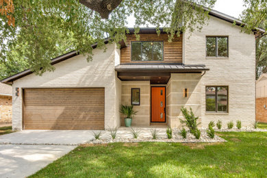 Inspiration for a mid-sized contemporary exterior home remodel in Dallas