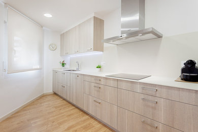 This is an example of a mid-sized contemporary single-wall eat-in kitchen in Other with a double-bowl sink, flat-panel cabinets, light wood cabinets, white splashback, medium hardwood floors and no island.