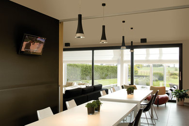 Photo of a modern dining room in Hampshire.