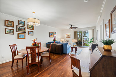 Inspiration for a mid-sized timeless vinyl floor and brown floor dining room remodel in Hawaii