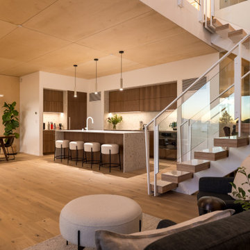 Evening great room - Fold House Berkeley Hills new construction