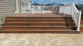 Fiberon deck with steps down to custom paver patio in Point of Rocks, MD